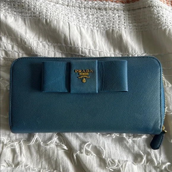 Prada | Bags | Prada Blue Wallet With Bow Accent | Poshmark display picture 1